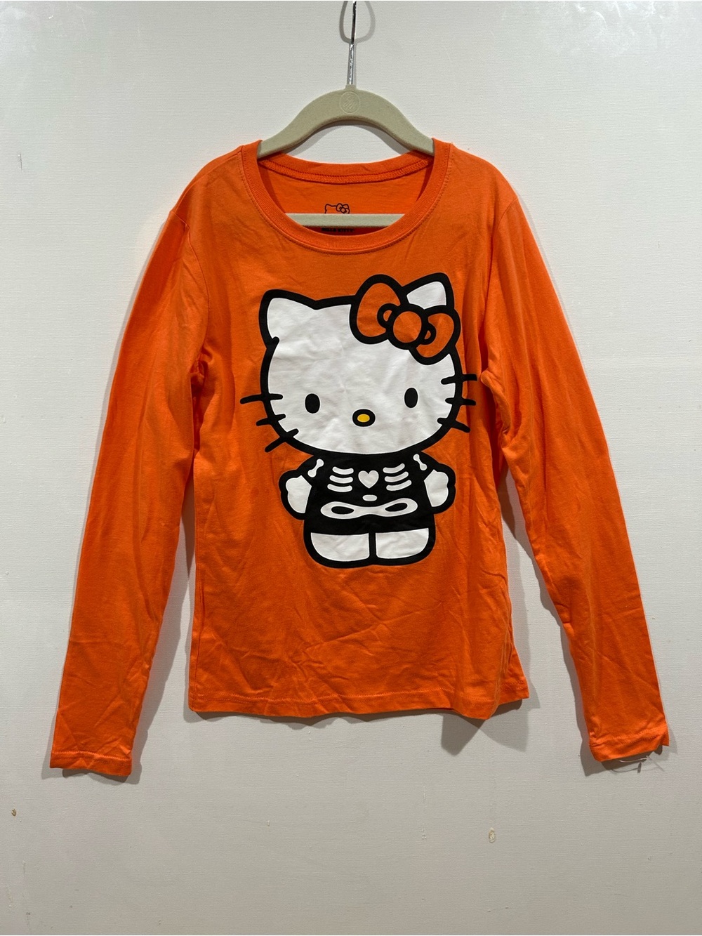 Hello Kitty Orange Long Sleeve Tee with Skeleton Graphic